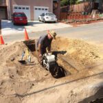 Sewer main connection proper compaction before paving